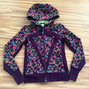 Girls Ivivva purple floral scuba zip up hoodie. Fleece lined size 12